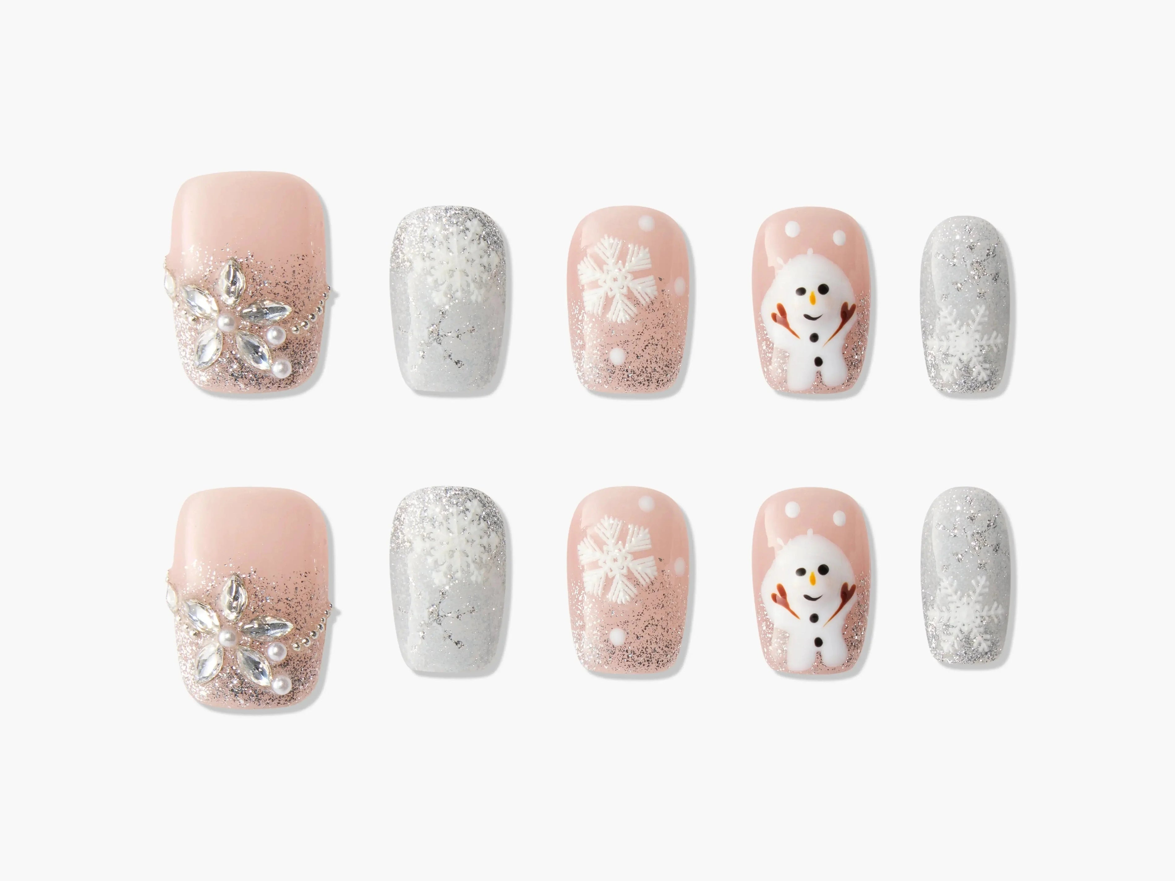Set of 10 winter-themed press-on nails with snowflakes, snowman, glitter, and rhinestone designs