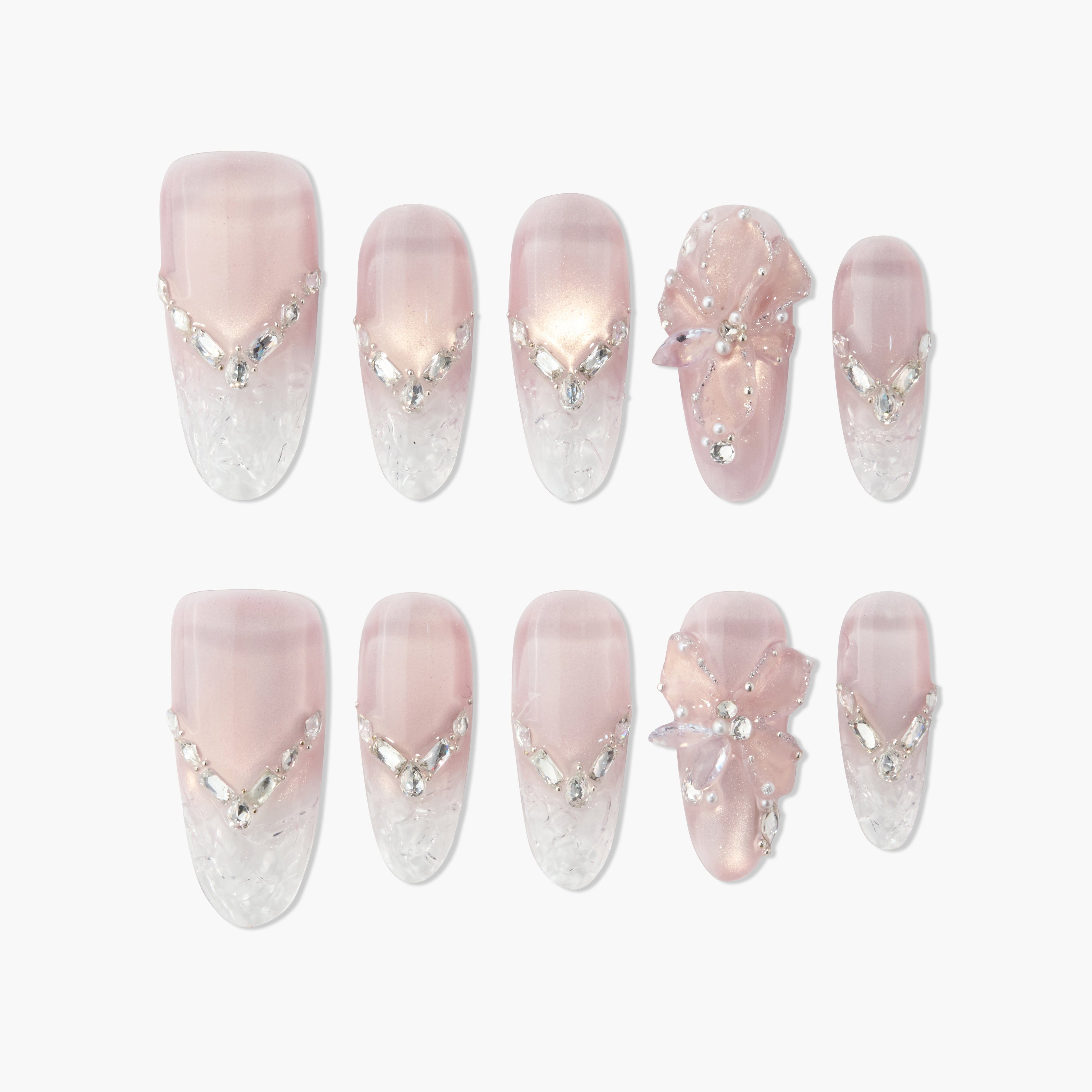 Set of pink and clear acrylic press-on nails with rhinestones and 3D flower design