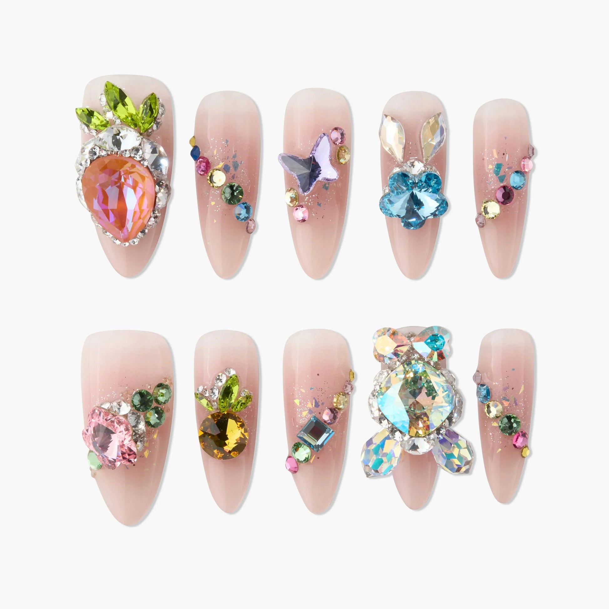 Set of pink ombre press-on nails with colorful rhinestones and 3D crystal fruit and butterfly designs