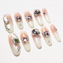 Handmade long ombre press-on nails with rhinestone and gem embellishments