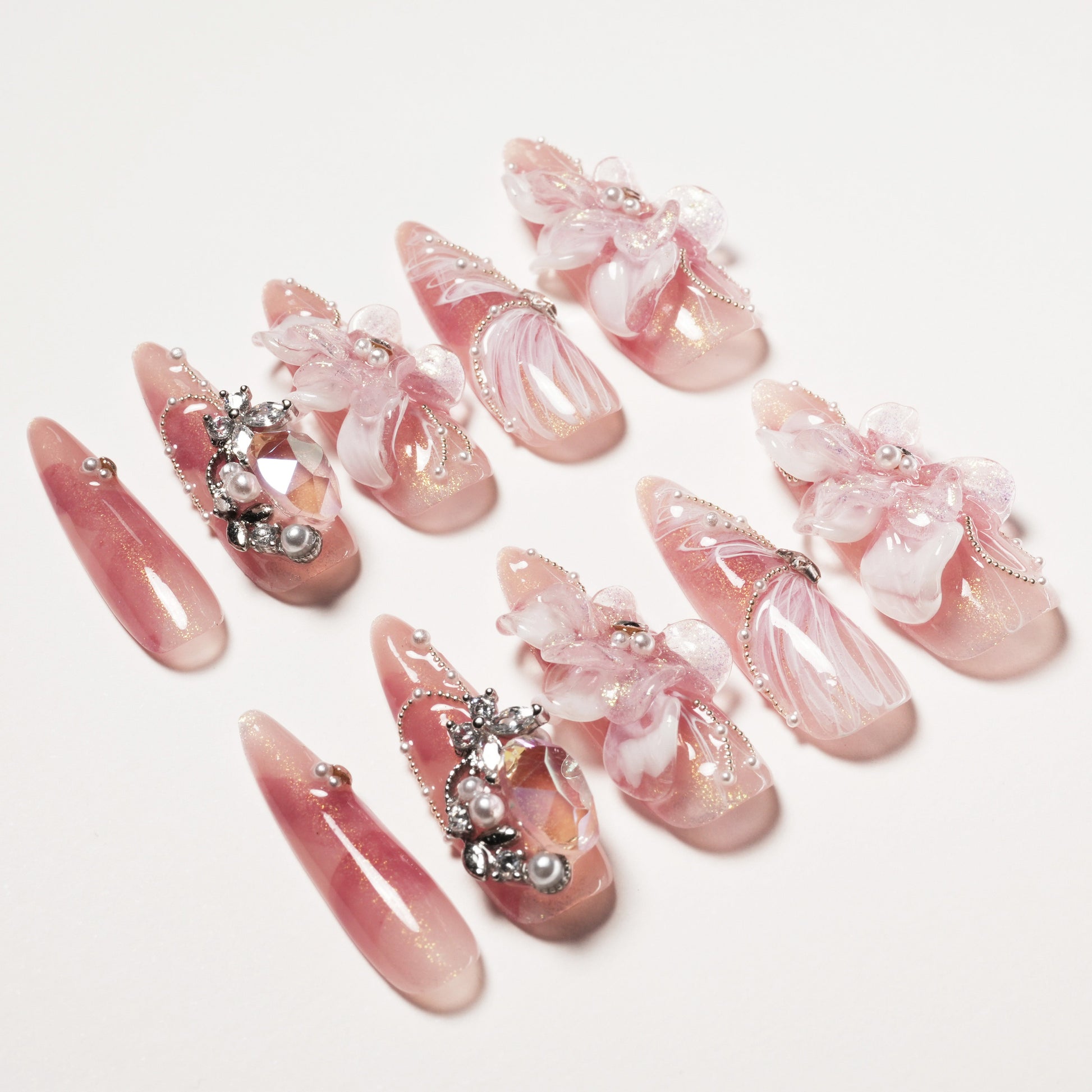 Set of pink glitter 3D flower and rhinestone embellished long stiletto press-on nails