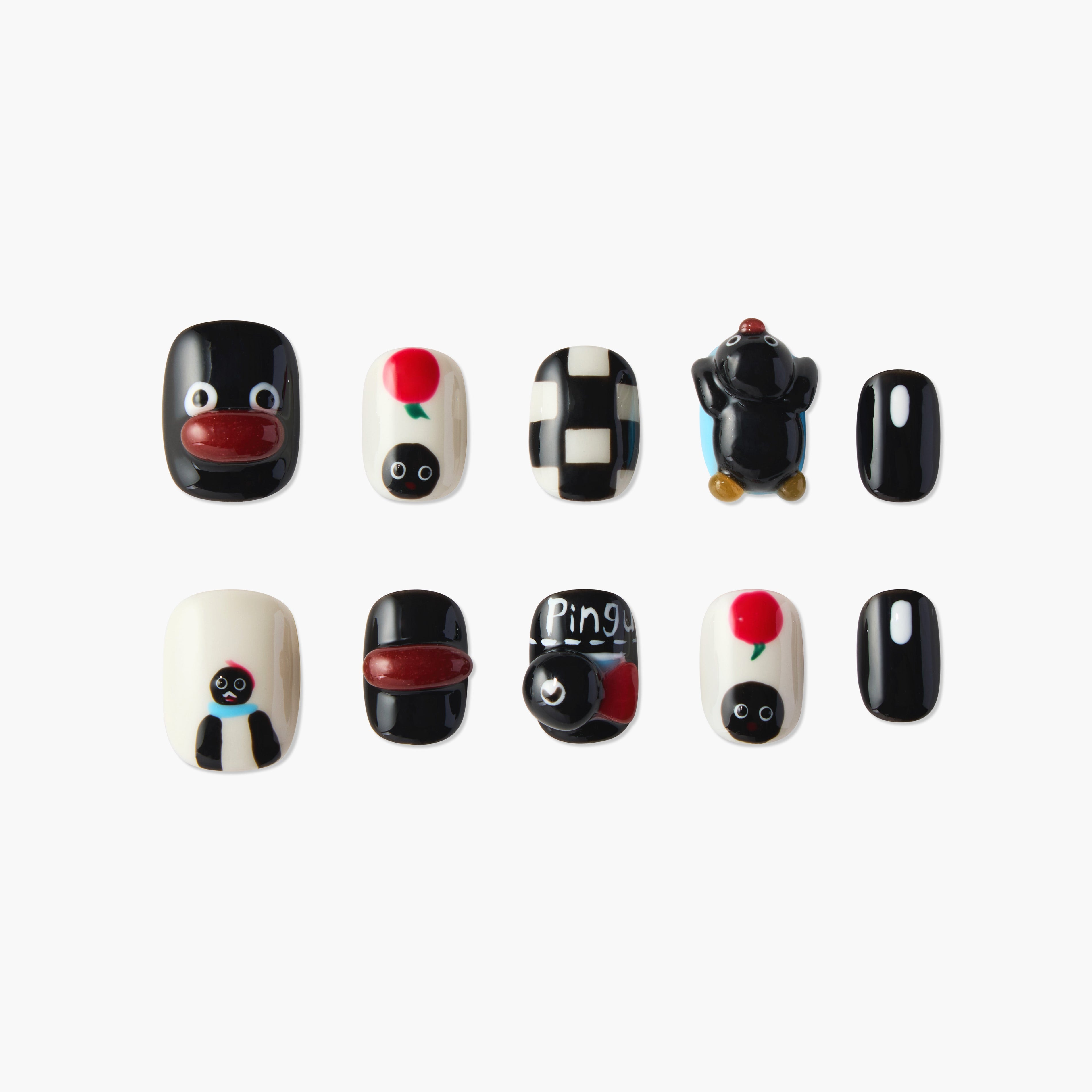 Set of artificial nails with Pingu cartoon designs, red rose, black and white patterns on white background