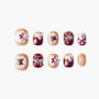 Christmas-themed false nails with 3D snowman, snowflake designs, beige and burgundy colors, and pearl charms