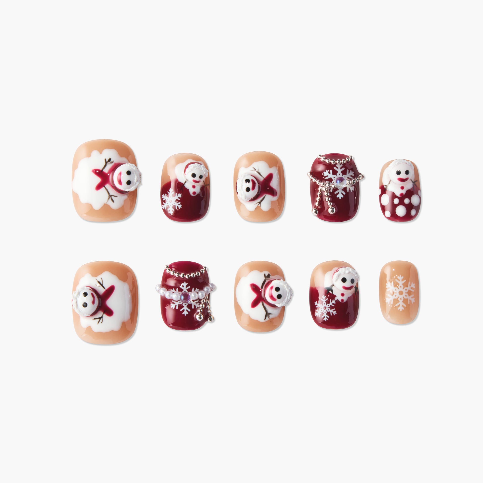 Christmas-themed false nails with 3D snowman, snowflake designs, beige and burgundy colors, and pearl charms