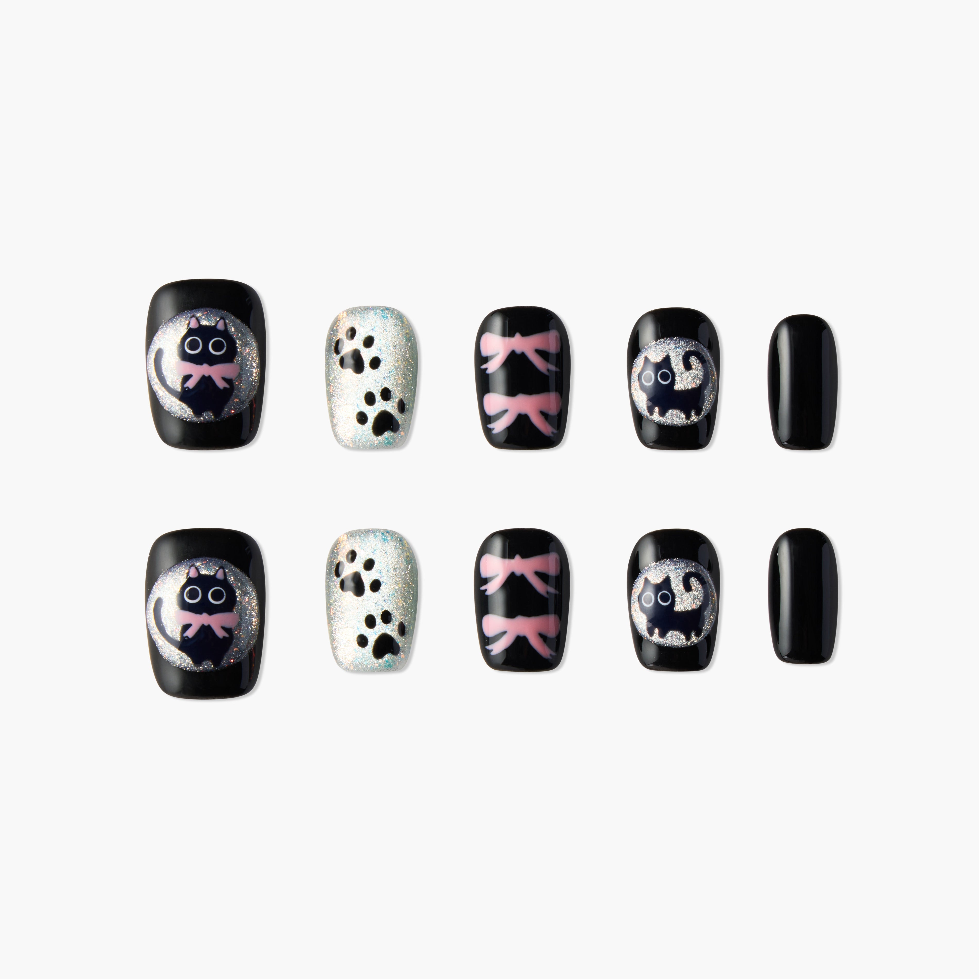 Set of black and glittery false nails with cute cat faces, paw prints, and pink bows nail art