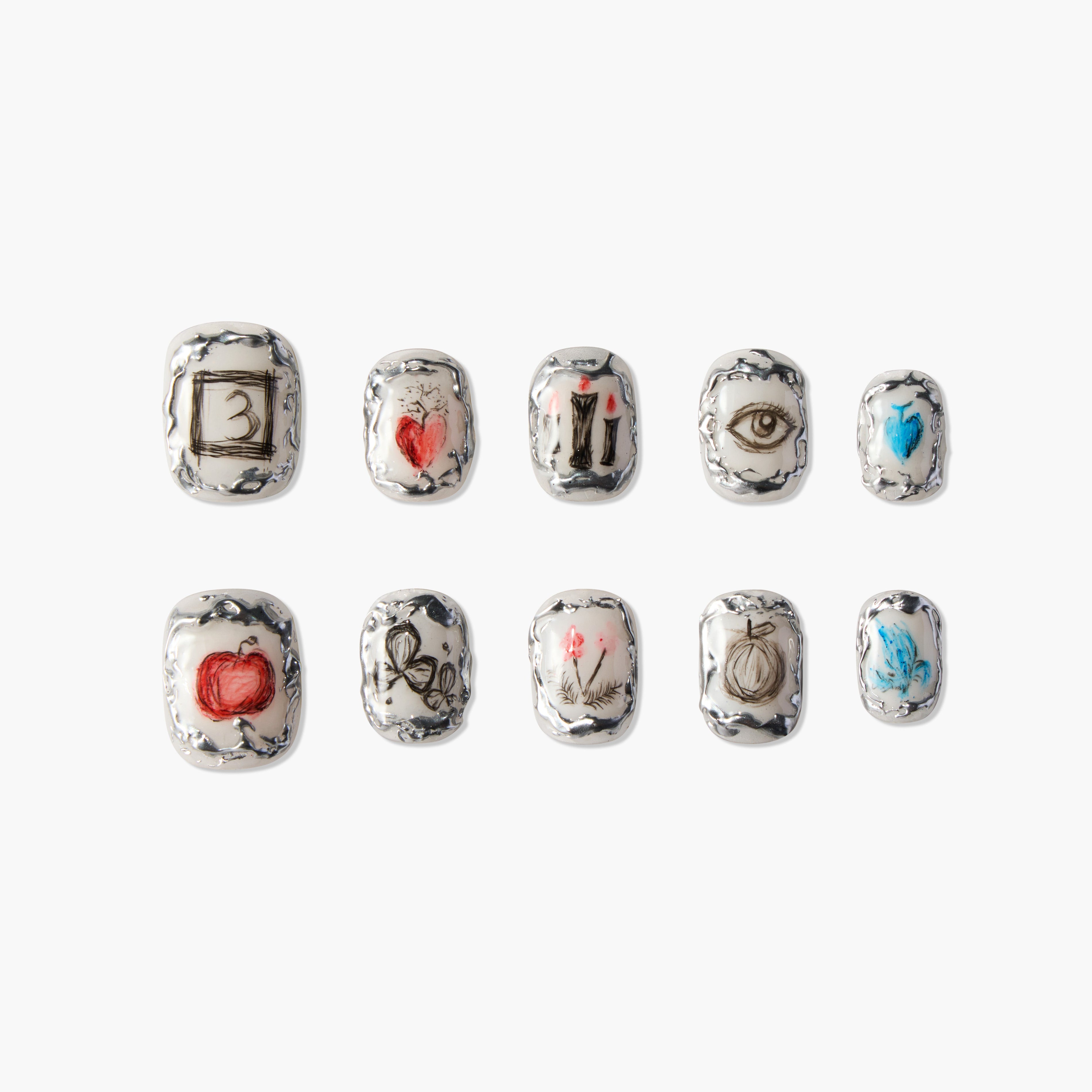Set of 10 silver-edged nail art tips with hand-drawn designs including hearts, eye, flowers, butterfly, and numbers
