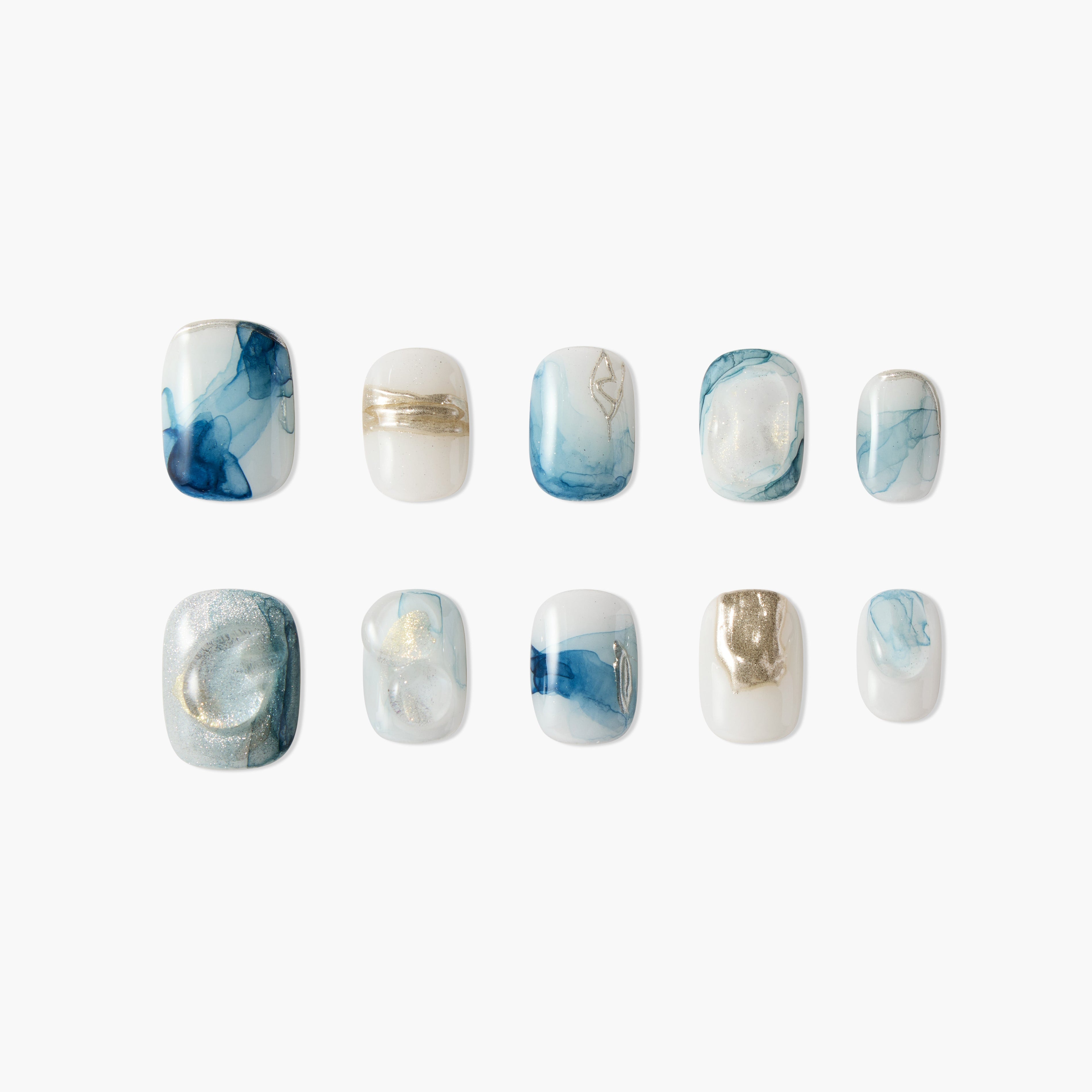 Set of blue, white, and gold marble-patterned press-on nails with abstract designs