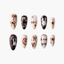 Handmade press-on nails with maroon bows, bunny art, hearts, and jewel accents on cream base