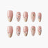 Set of pink and beige press-on nails with pearl, rhinestone, and bow nail art designs