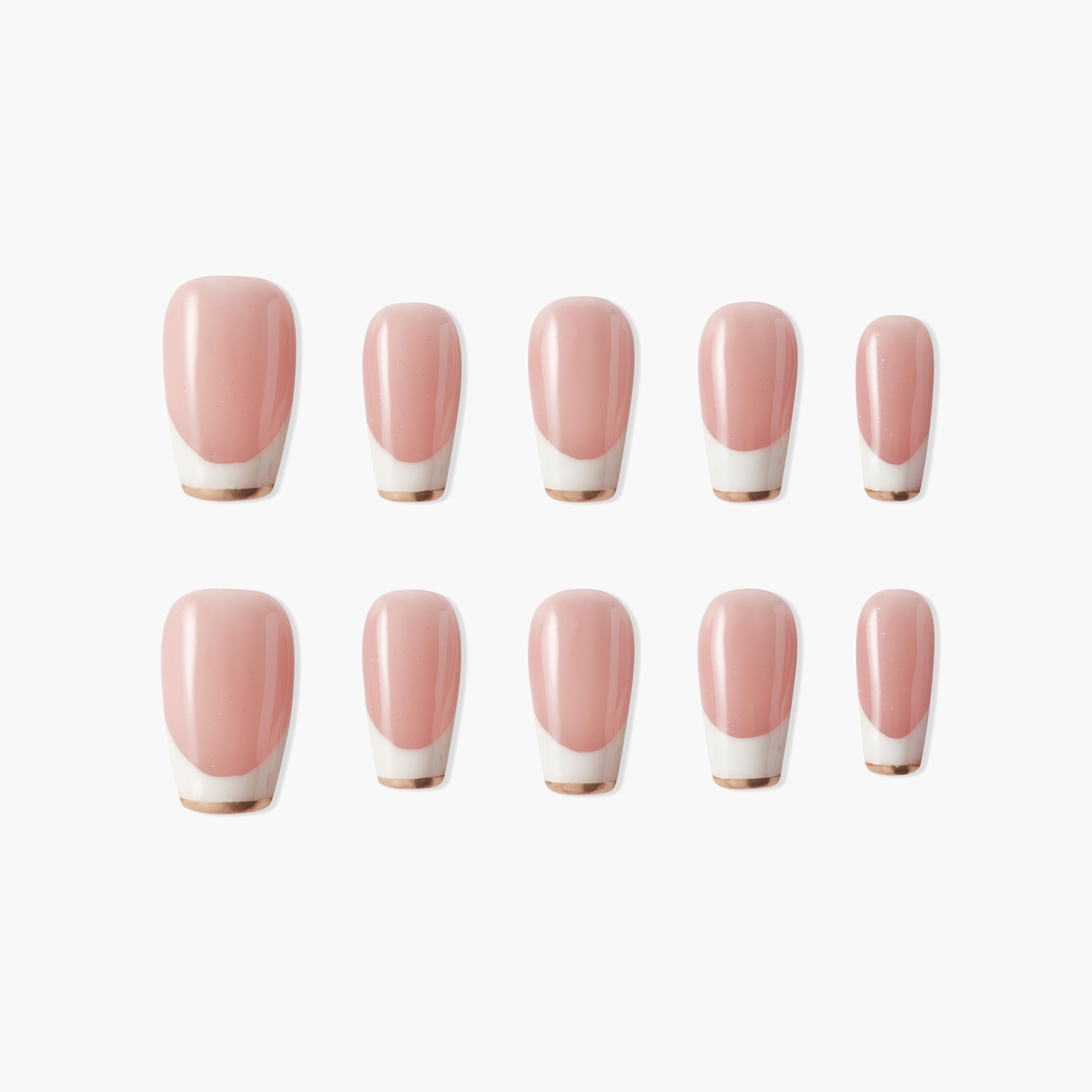 Set of natural pink and white French tip press-on nails in various sizes on white background