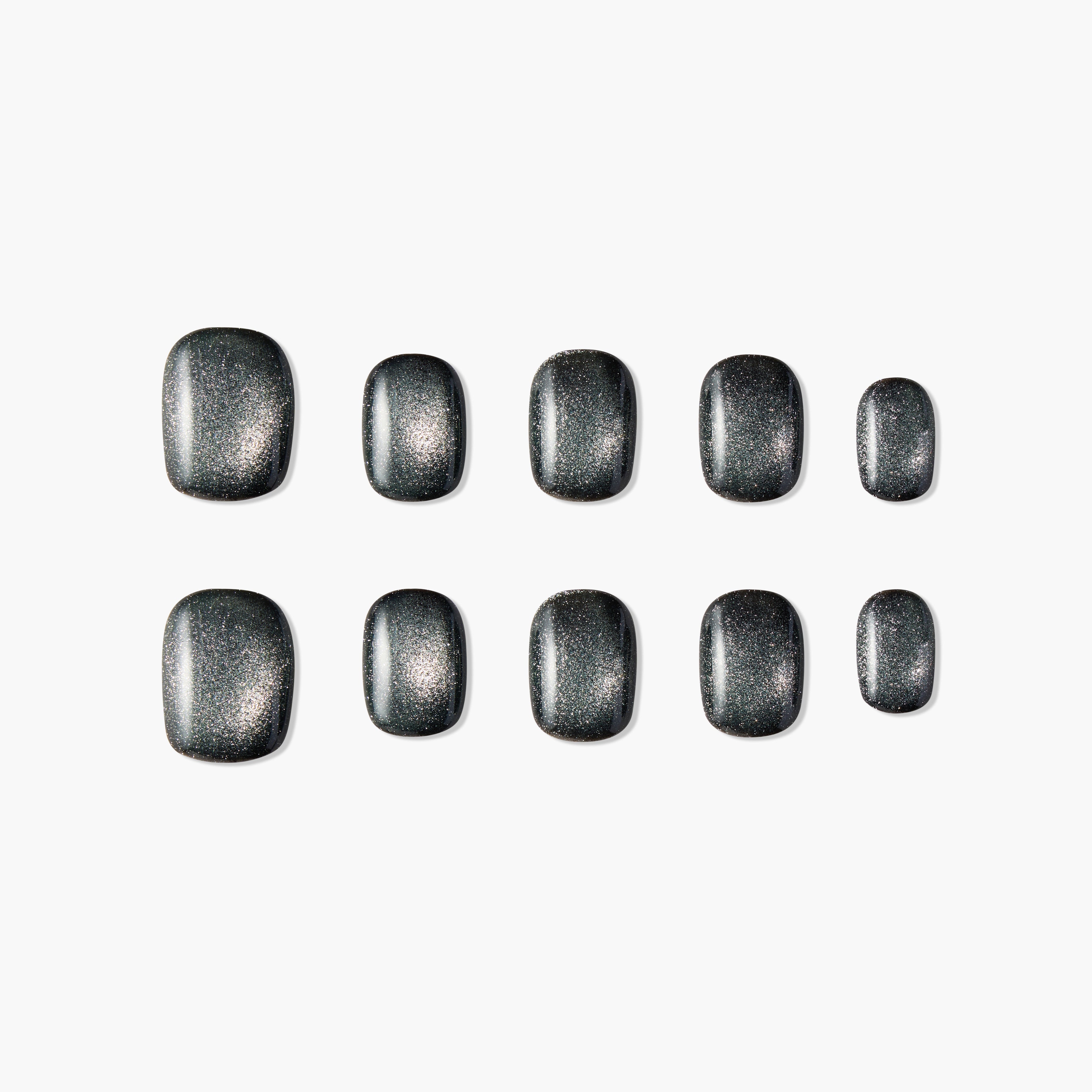 Set of shiny dark gray glitter press-on square nails arranged in two rows on white background