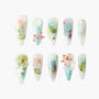 Handmade press-on nails with pastel floral designs, 3D accents, and aquatic-inspired art.