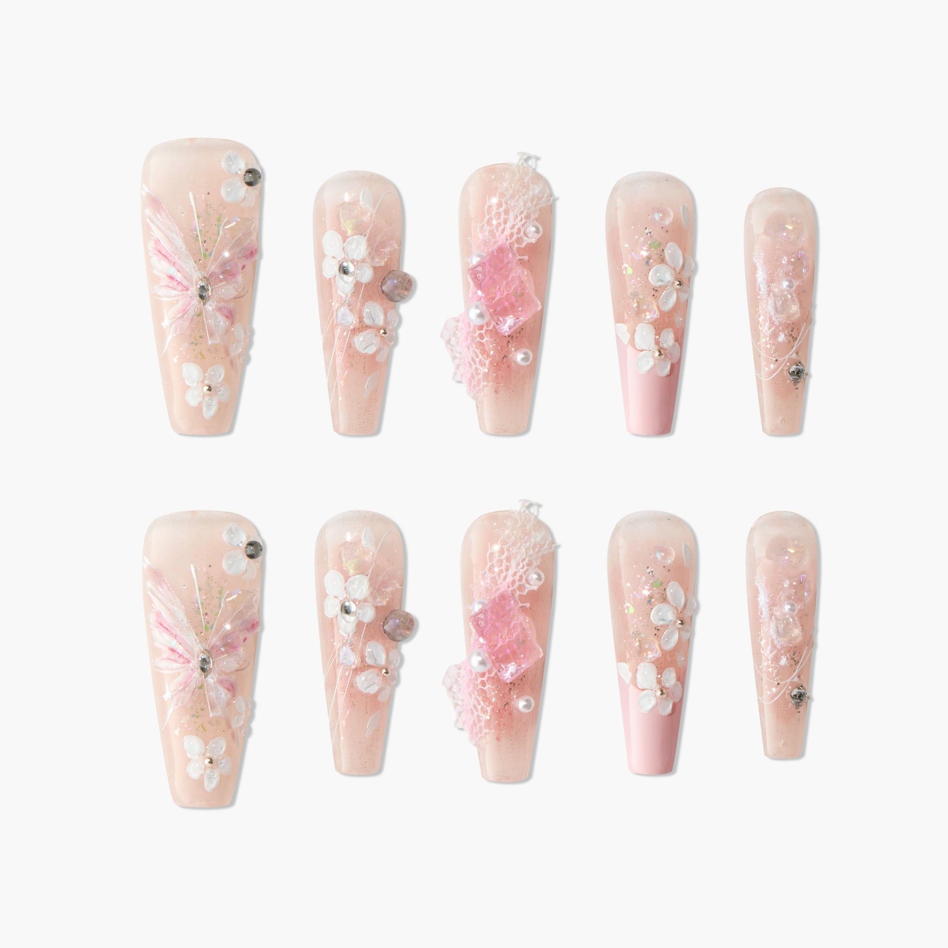 Handmade pink press-on nails with 3D floral designs, butterfly art, gems, and glitter accents.