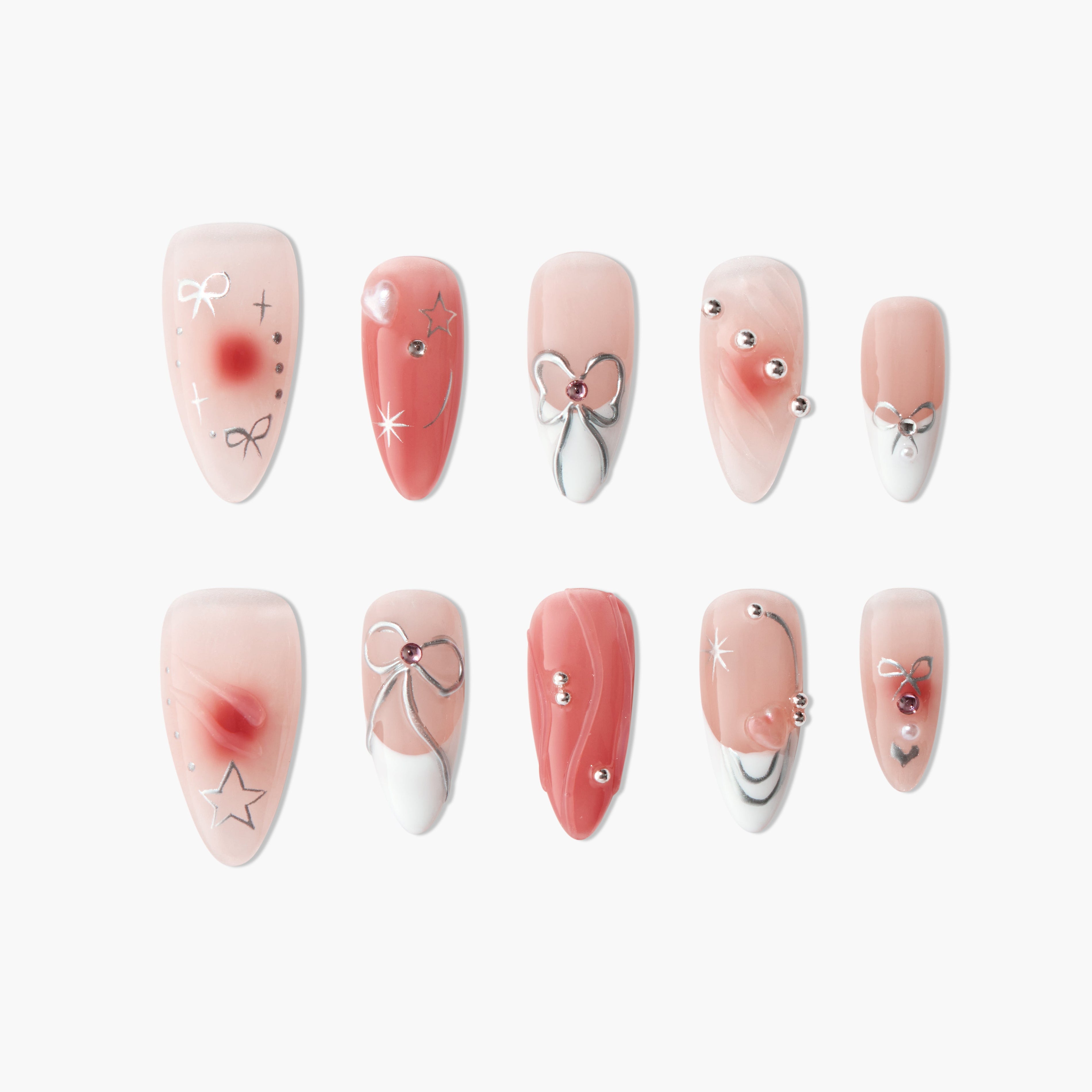 Set of 10 pink and nude artificial nails with bow, star, pearl, and rhinestone nail art designs