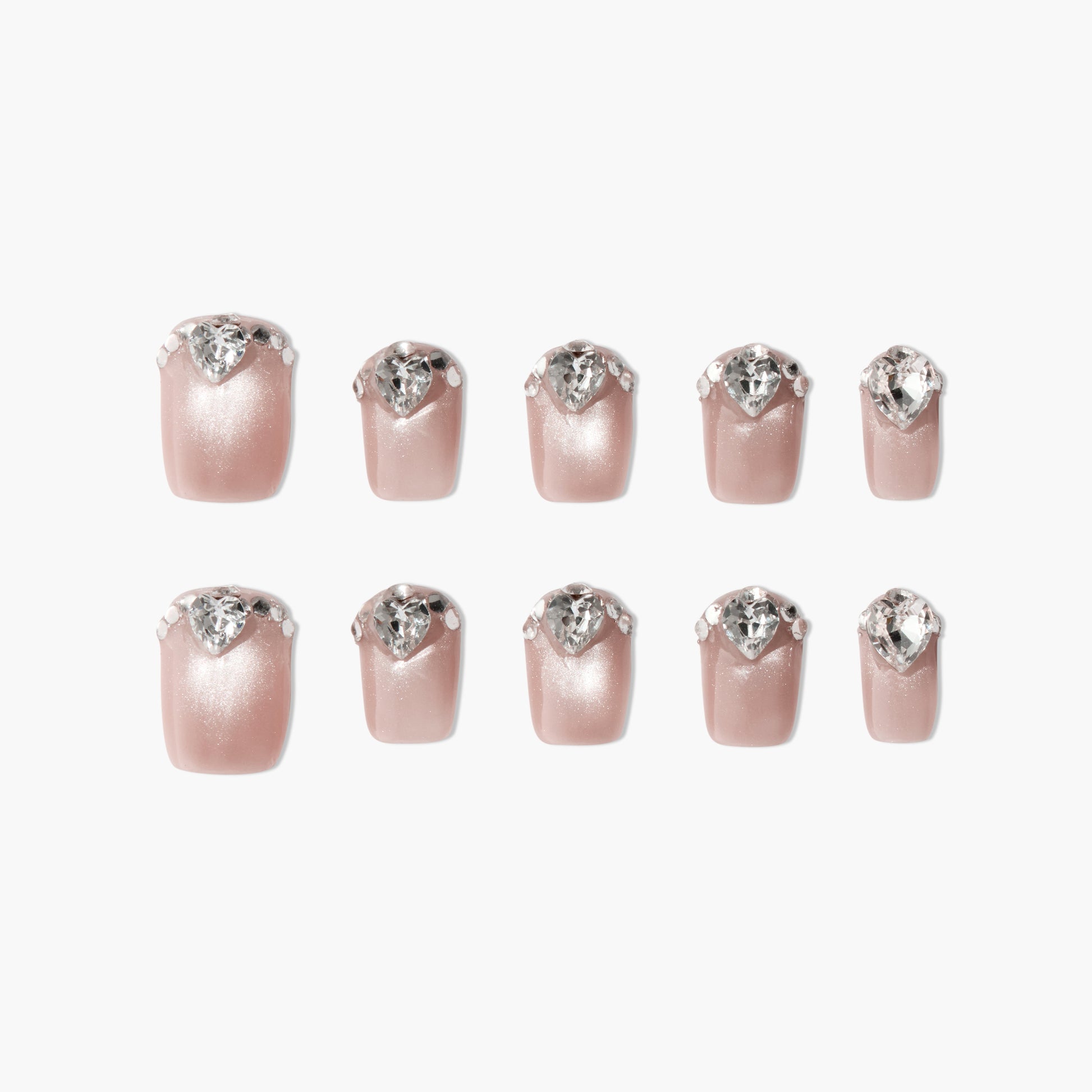 Set of 10 shimmering nude pink press-on nails with clear teardrop rhinestone accents