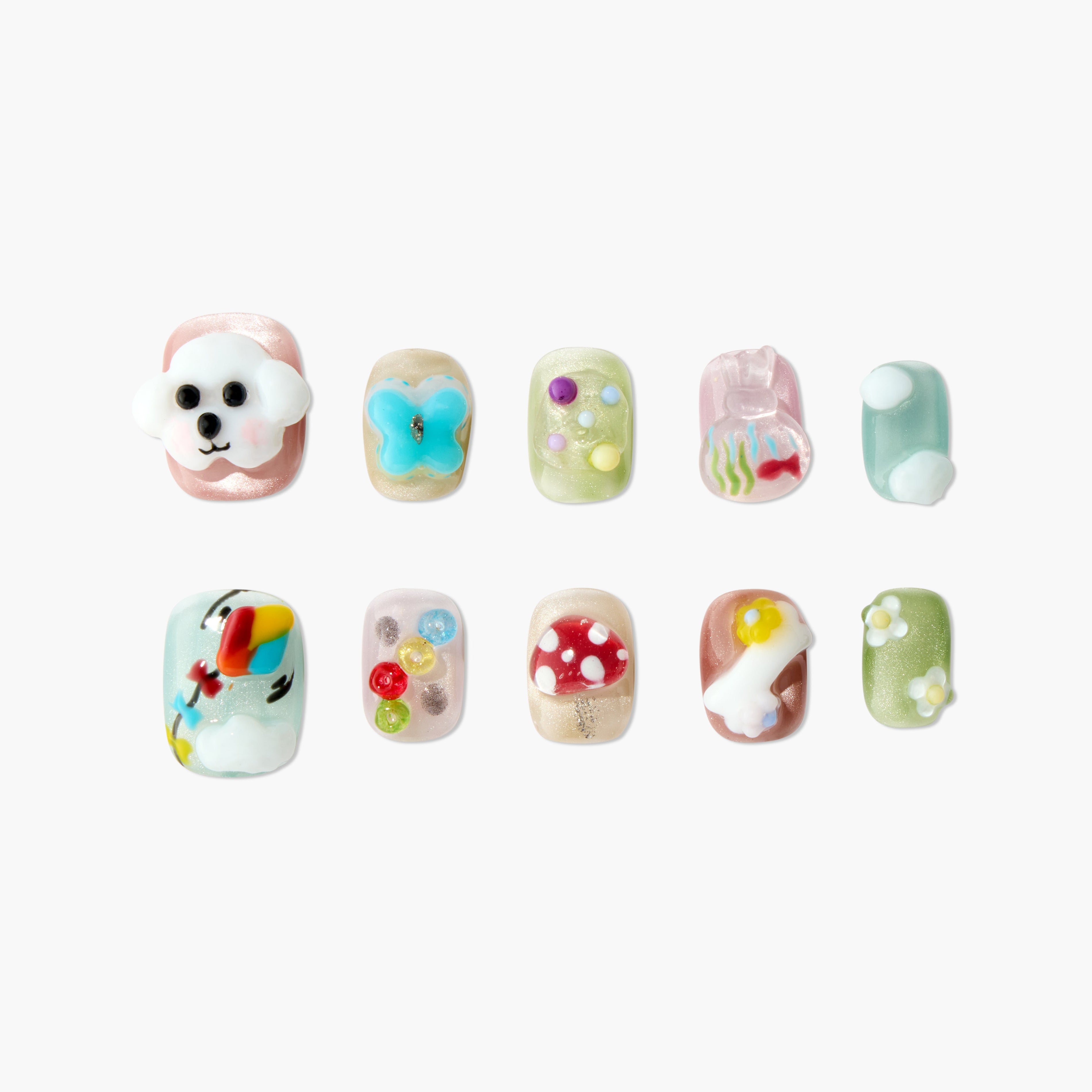Set of 10 colorful 3D textured press-on nails with designs including dog, butterfly, fish, balloon, mushroom, and flowers