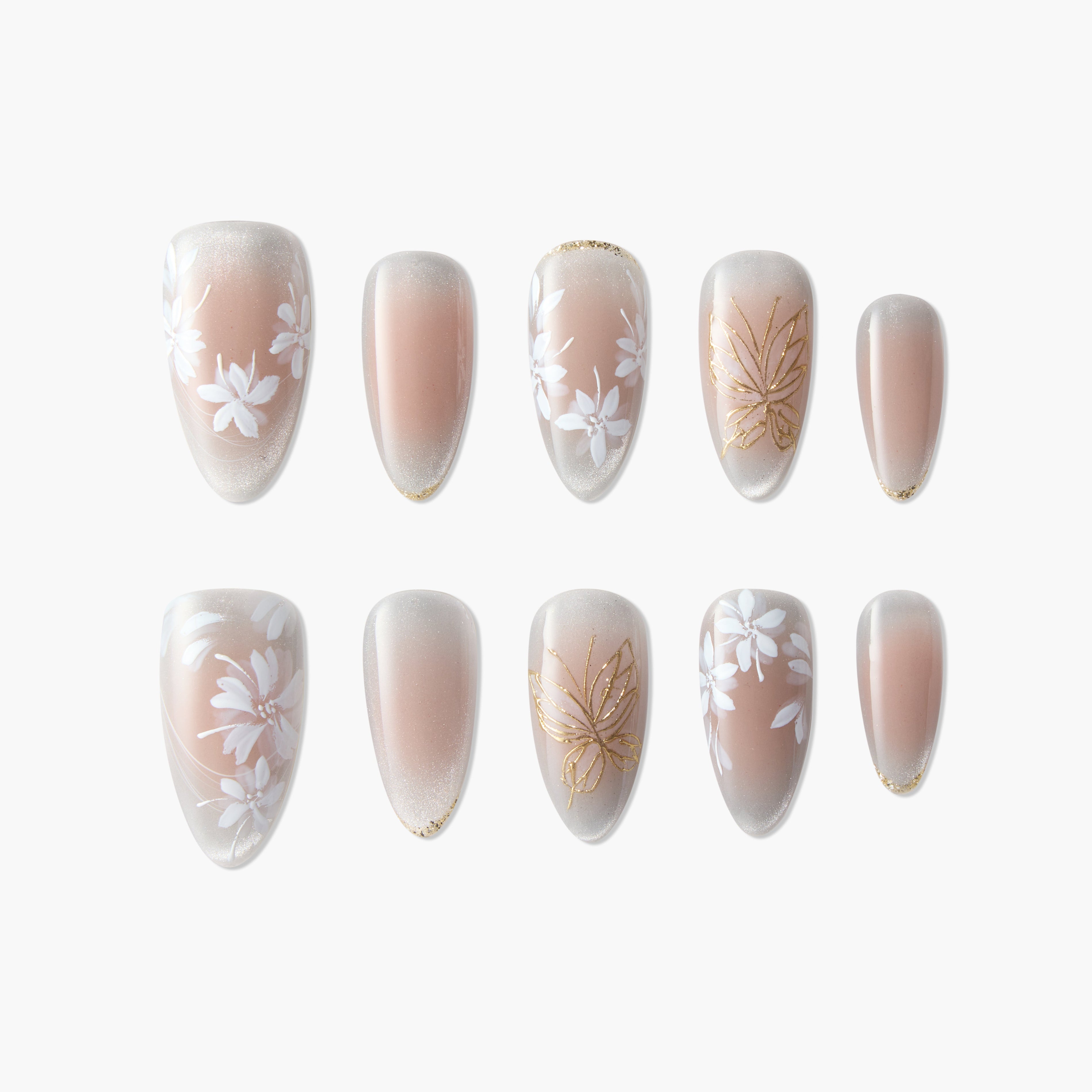 Set of elegant false nails with nude gradient base, white floral and gold leaf designs