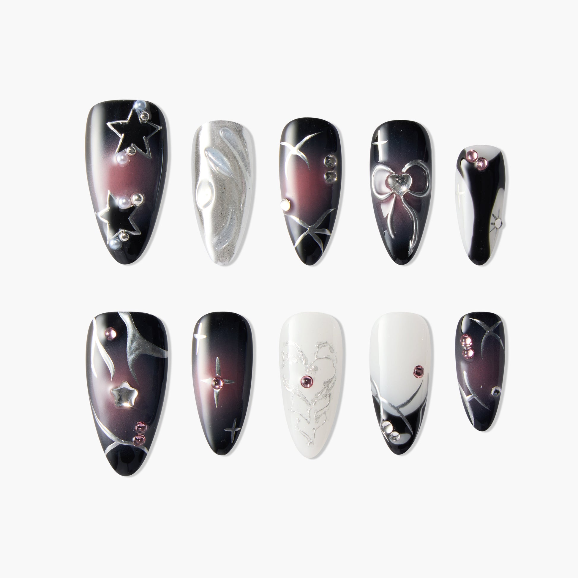 Handmade press-on nails with black, white, and silver galaxy theme, star and heart accents