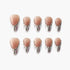 Set of ten nude and silver gradient press-on nails with rhinestone accents on white background