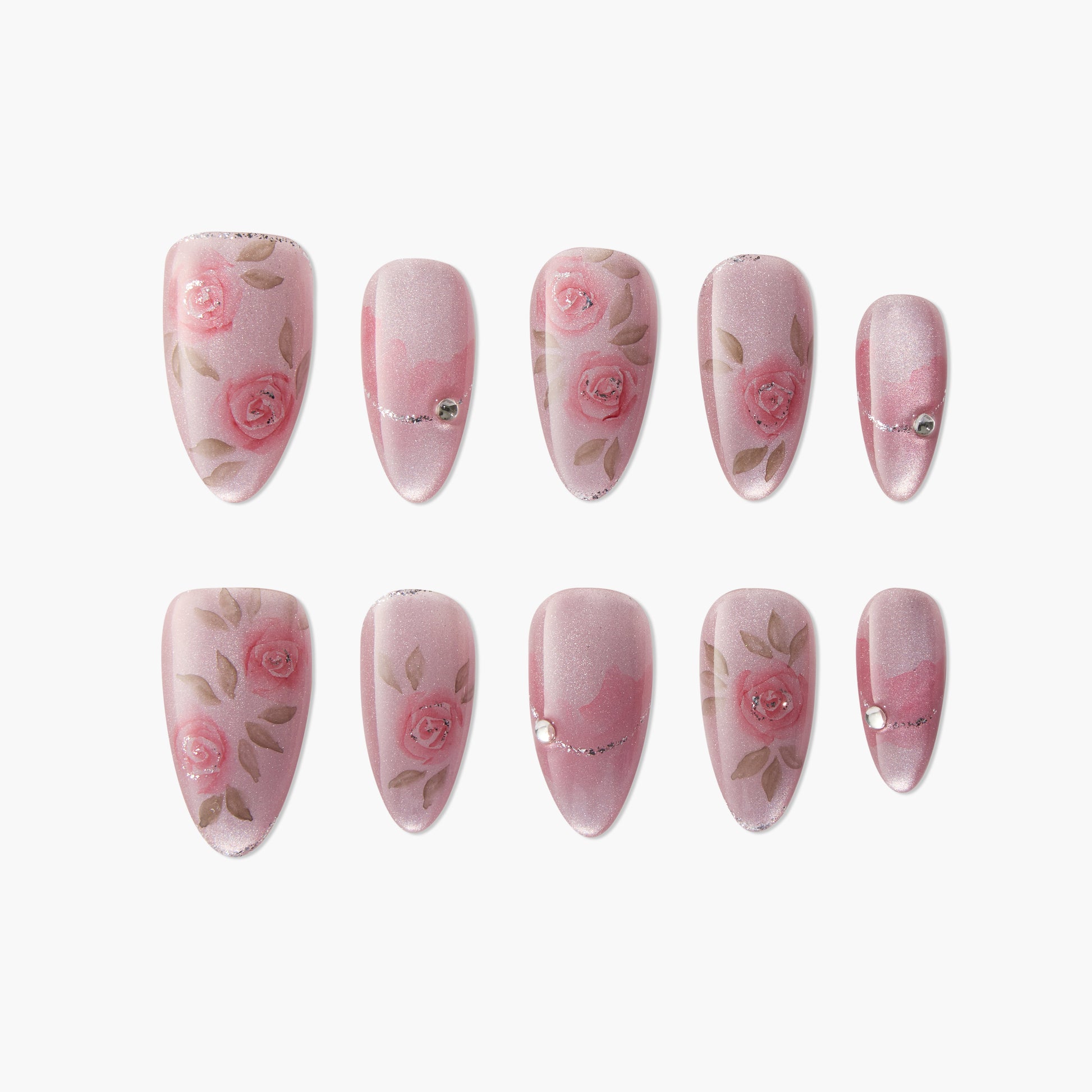 Set of pink glitter press-on nails with hand-painted rose and leaf designs and rhinestone accents