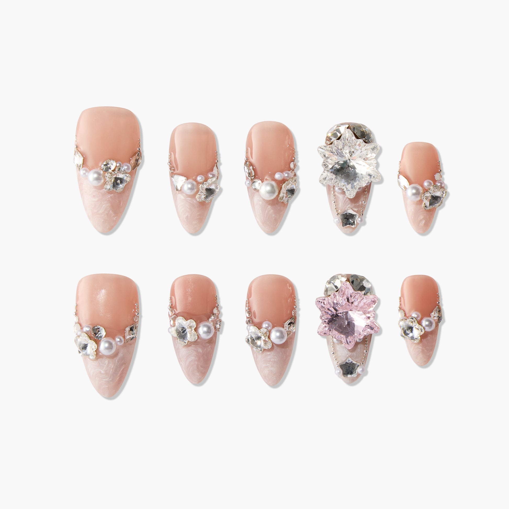 Set of nude pink stiletto false nails with pearl and crystal flower embellishments