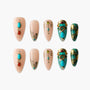 Handmade press-on nails with nude, turquoise, and gold jeweled designs, floral accents