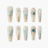 Set of 10 translucent beige and blue 3D embellished press-on nails with butterfly and gem designs
