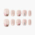 Set of nude pink fake nails with pearl and pink bow decorations and iridescent bow designs