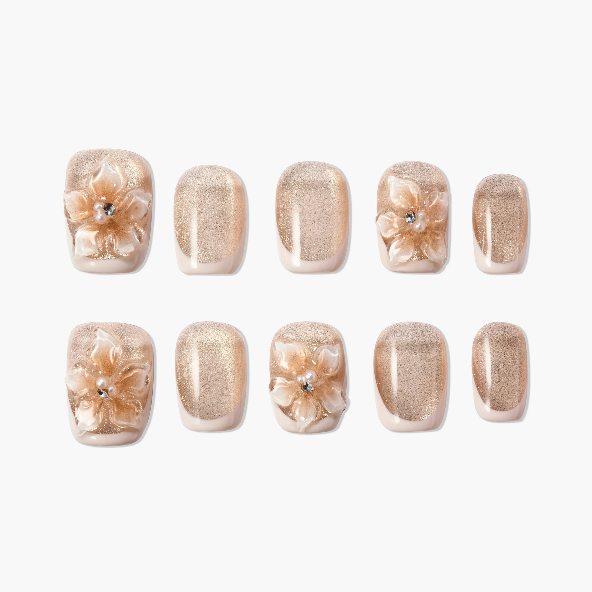 Gold glitter press-on nails with 3D floral accents and rhinestone details, reusable nail set
