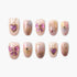 Set of 10 pastel pink and purple false nails with gold celestial and bow designs
