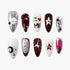 Set of 10 decorative false nails with red, white, and silver designs including dice, stars, and 3D beads
