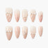 Set of nude and white ombre press-on nails with 3D pearl and bow nail art designs