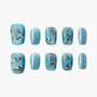 Set of blue press-on nails with glittery gold branches and small blue bird designs