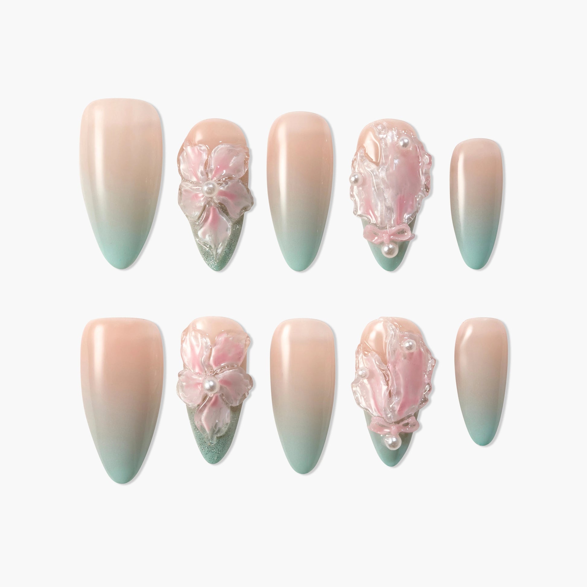 Handmade press-on nails with pink and green ombre, 3D floral and pearl accents.