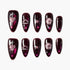 Set of glossy dark burgundy press-on nails with pink 3D heart, lips, star, and swirl designs