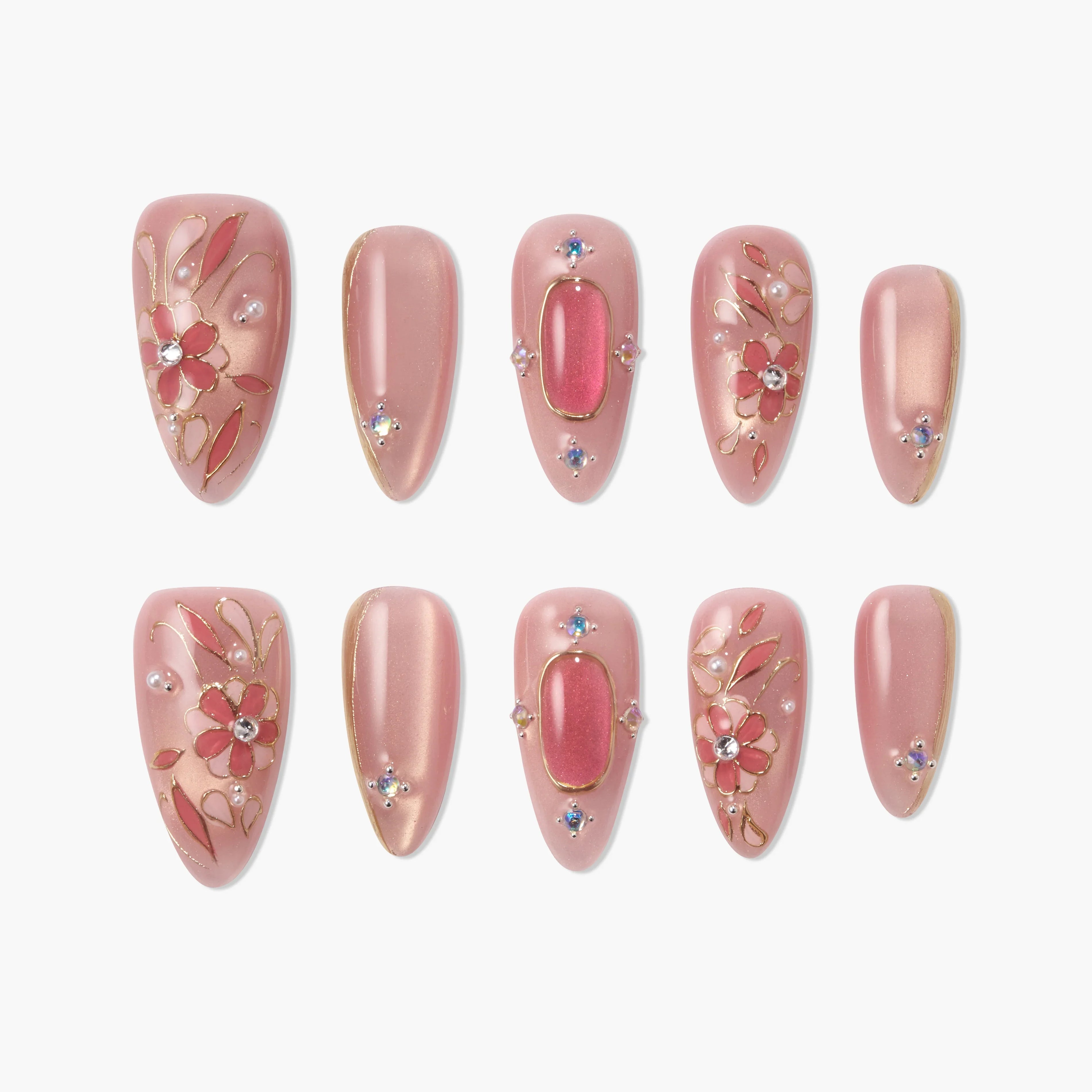Handmade pink press-on nails with gold floral designs, crystals, and pearl accents