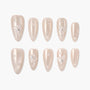 Pearl white press-on nails with 3D butterfly and gem accents, elegant manicure set