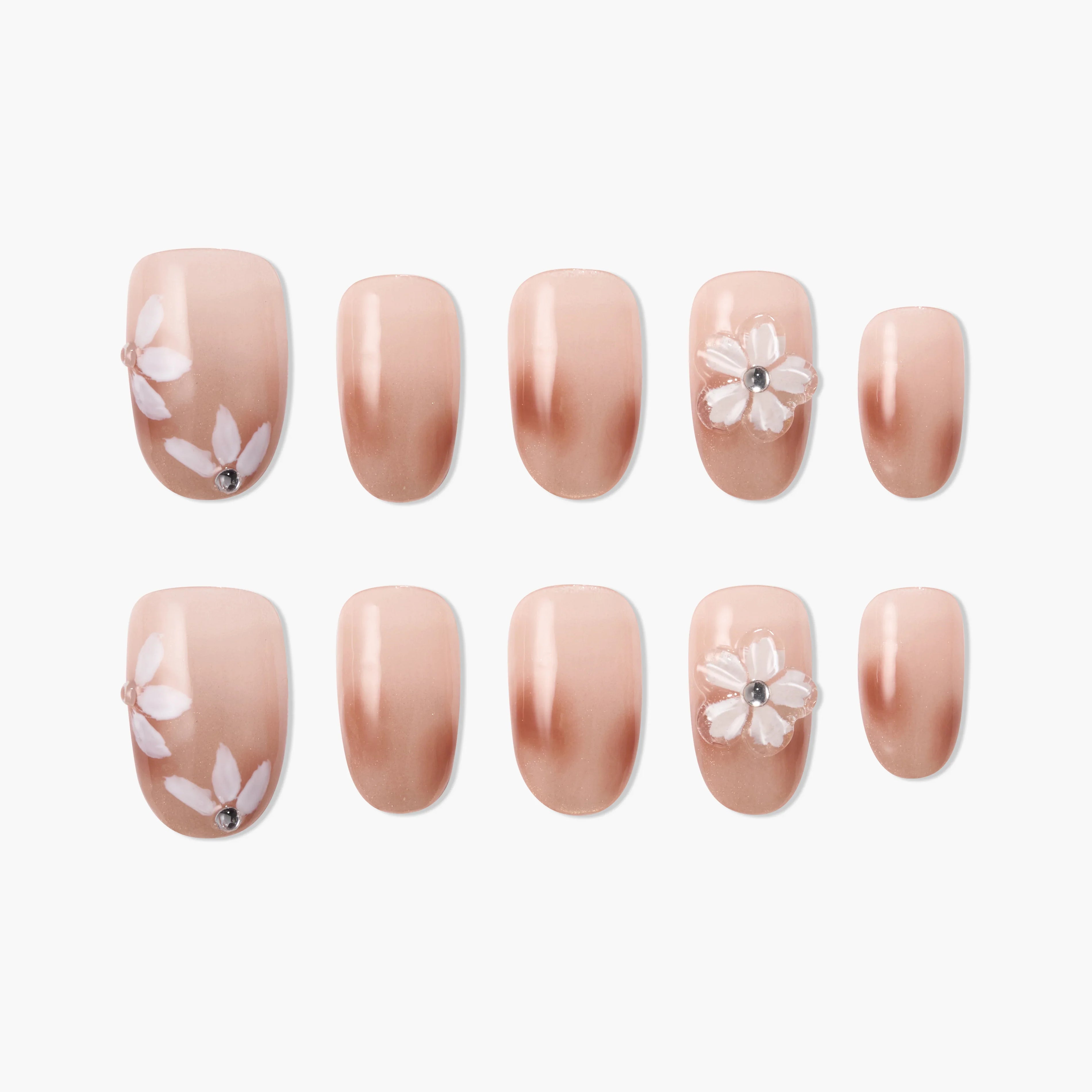 Handmade nude press-on nails with white 3D floral accents and rhinestones, set of ten
