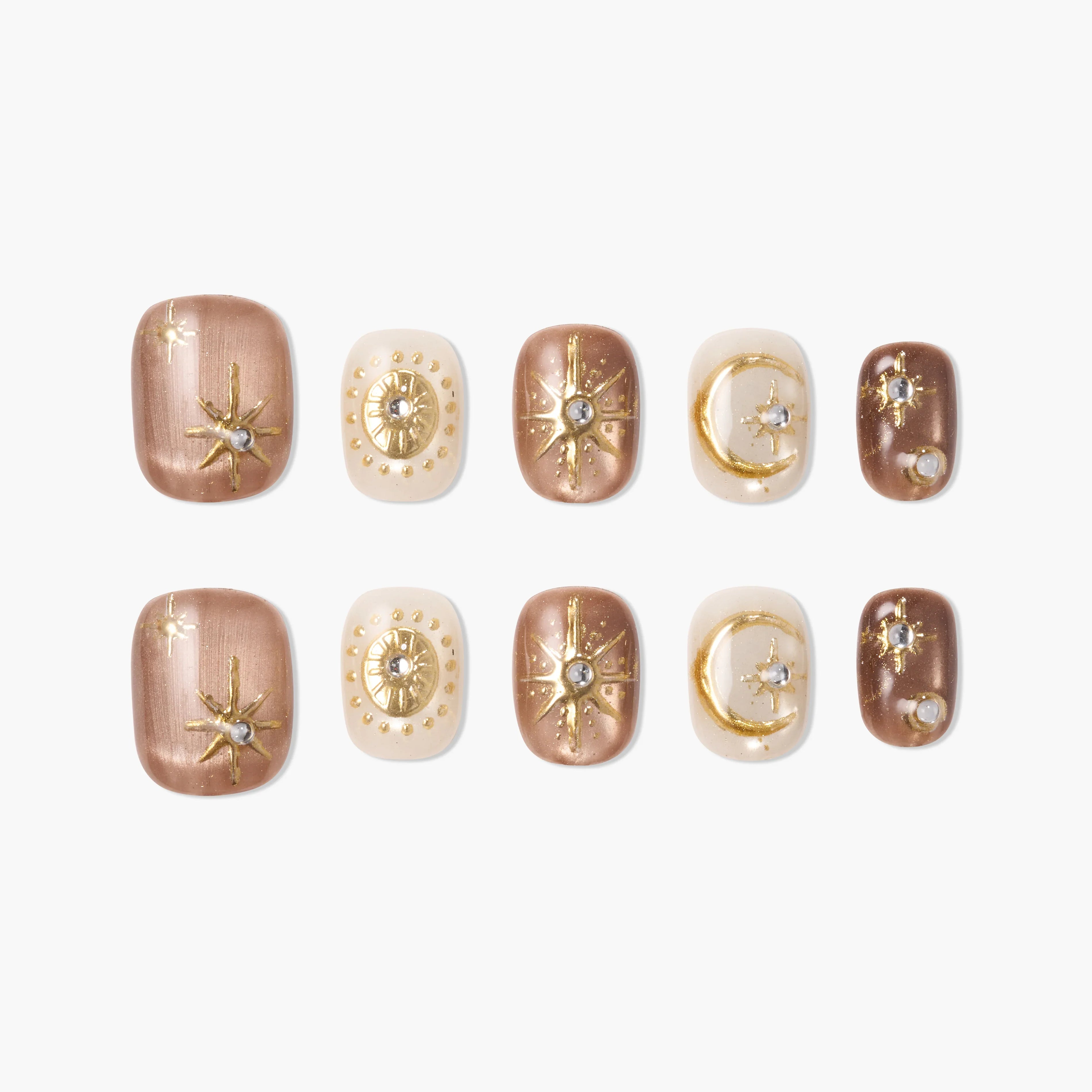 Handmade press-on nails in brown and ivory with gold celestial designs and rhinestone accents