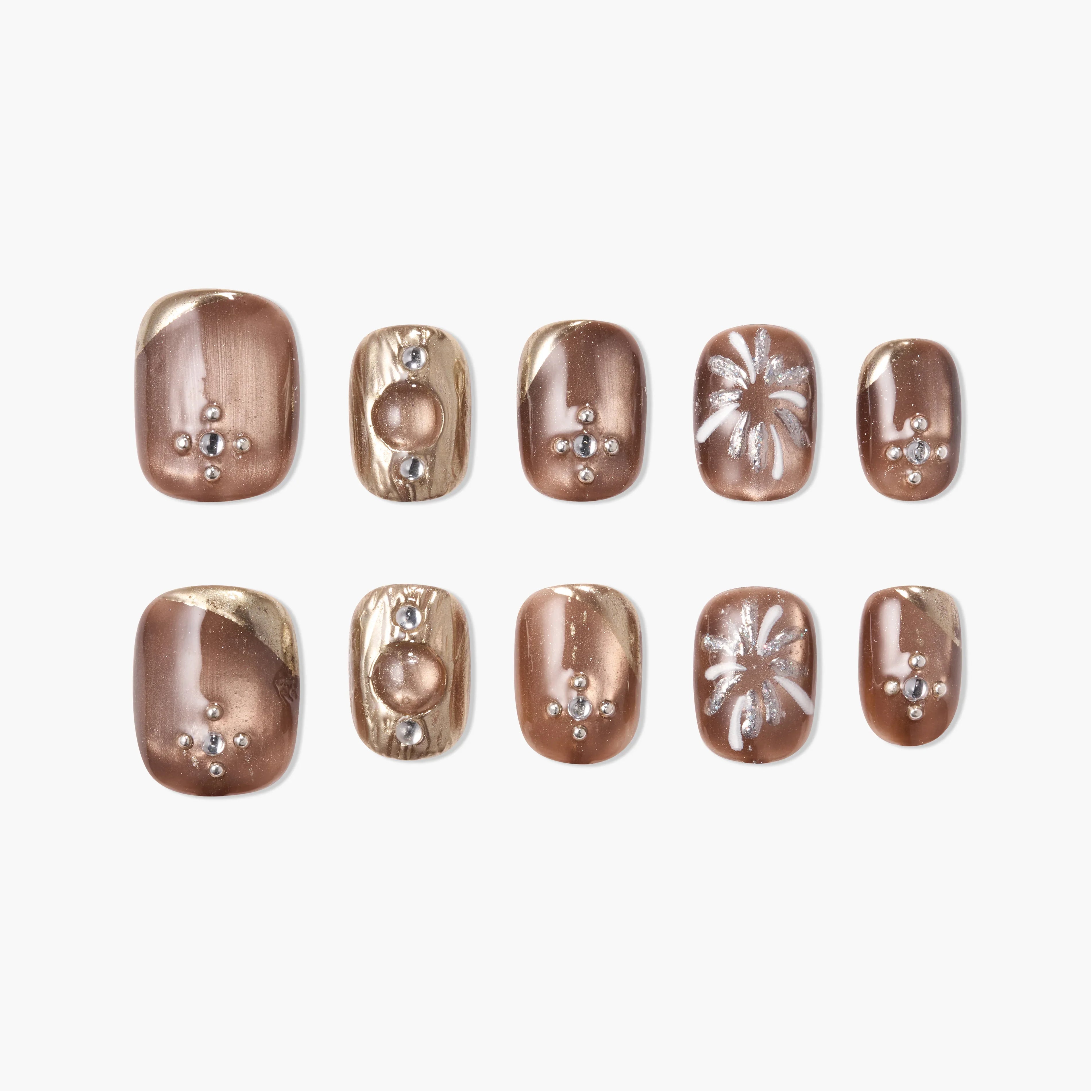 Handmade brown and gold press-on nails with metallic designs and rhinestone accents