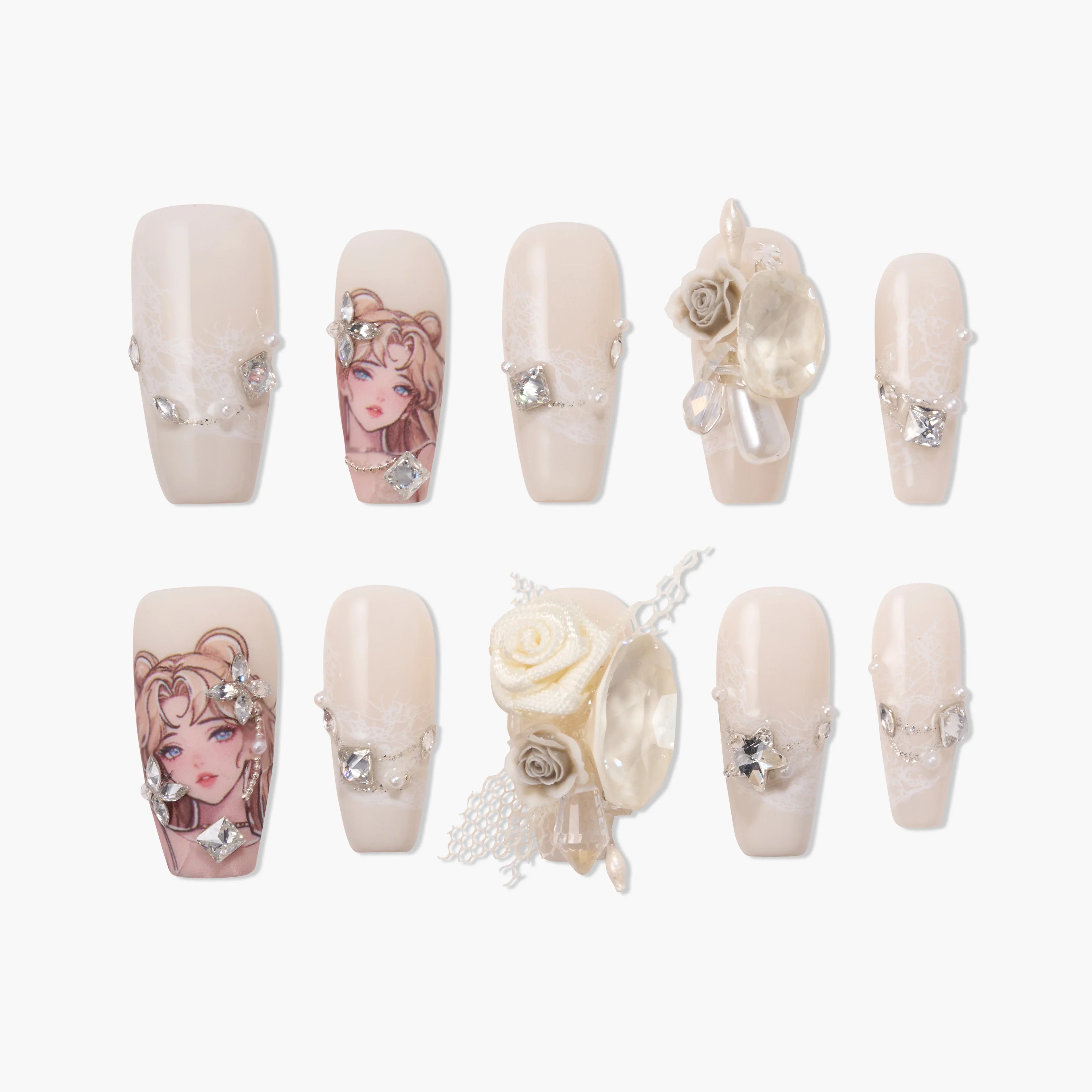 Handmade press-on nails with 3D floral accents, crystals, and anime-inspired art on nude base