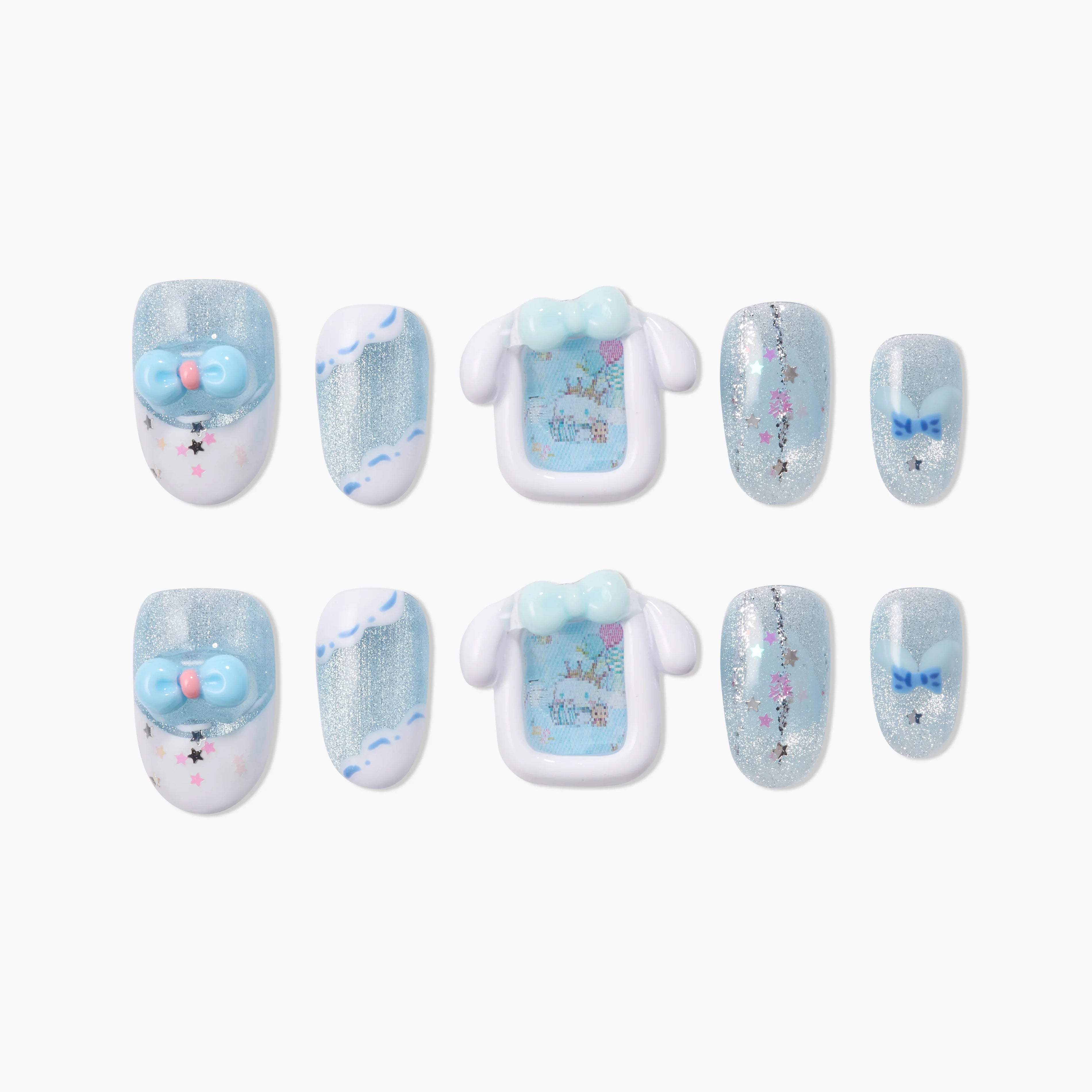 Handmade blue and silver press-on nails with 3D bows, glitter, stars, and whimsical designs