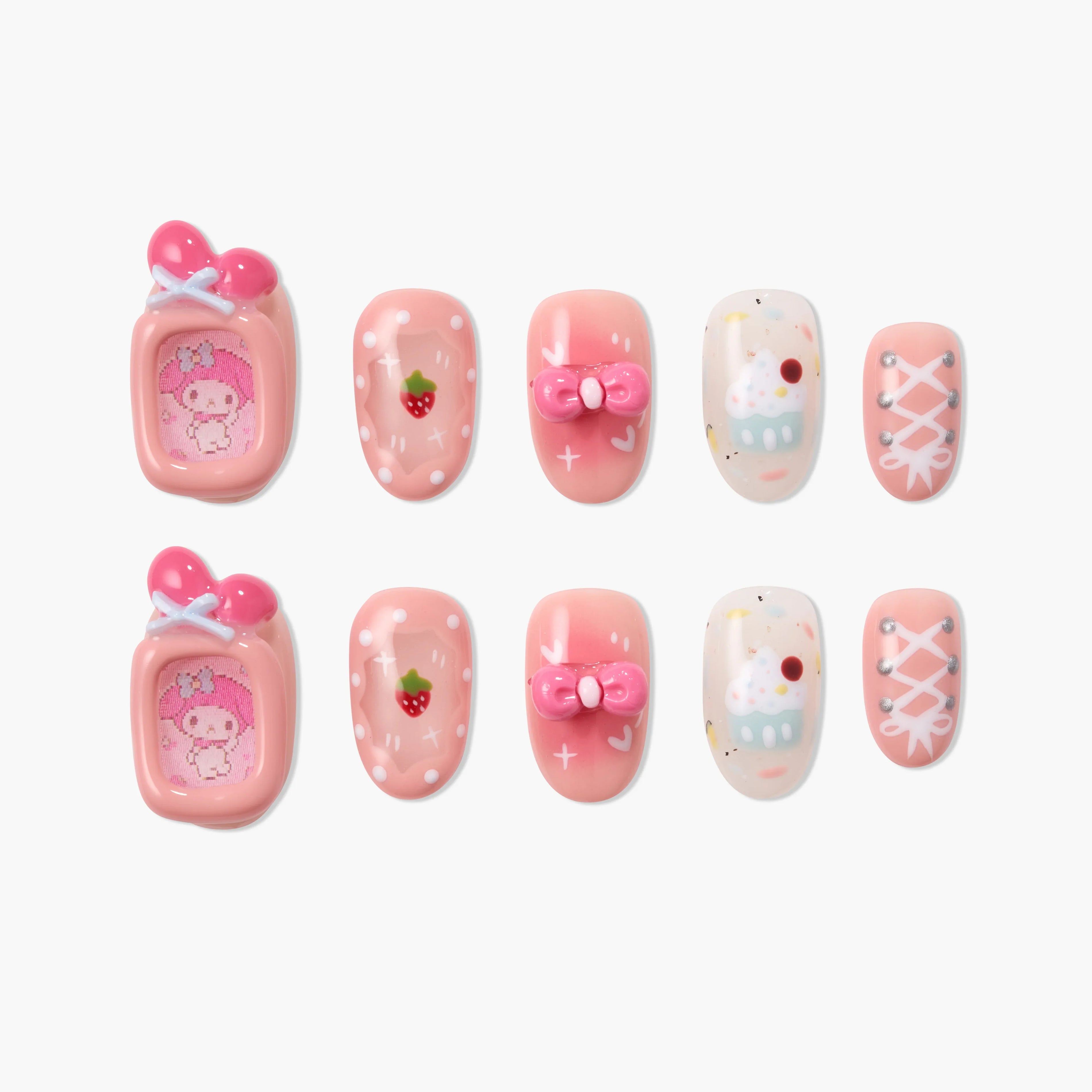 Cute pink press-on nails with cartoon, strawberry, cupcake, bow, and lace-up designs