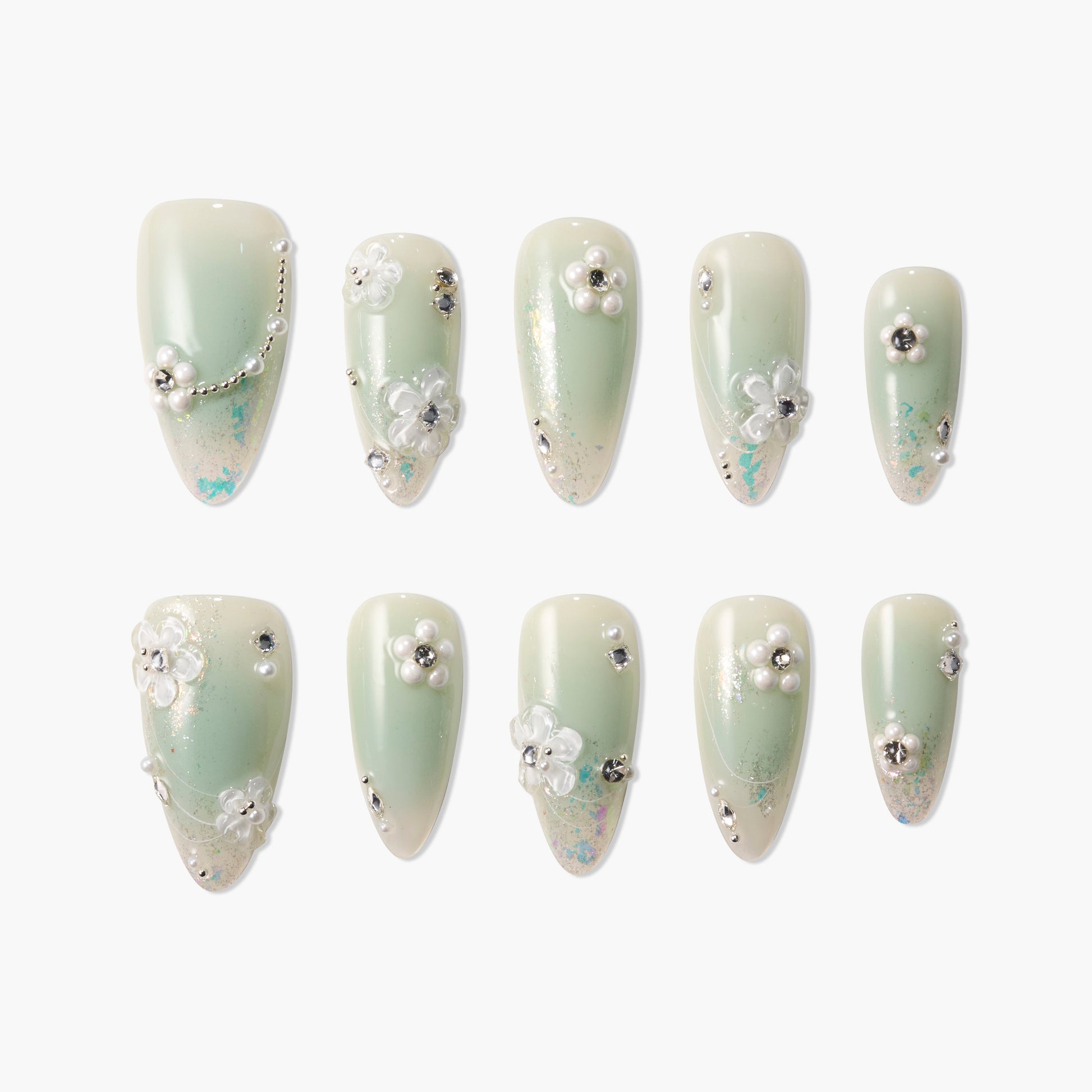Handmade green press-on nails with pearl, floral, and rhinestone 3D embellishments