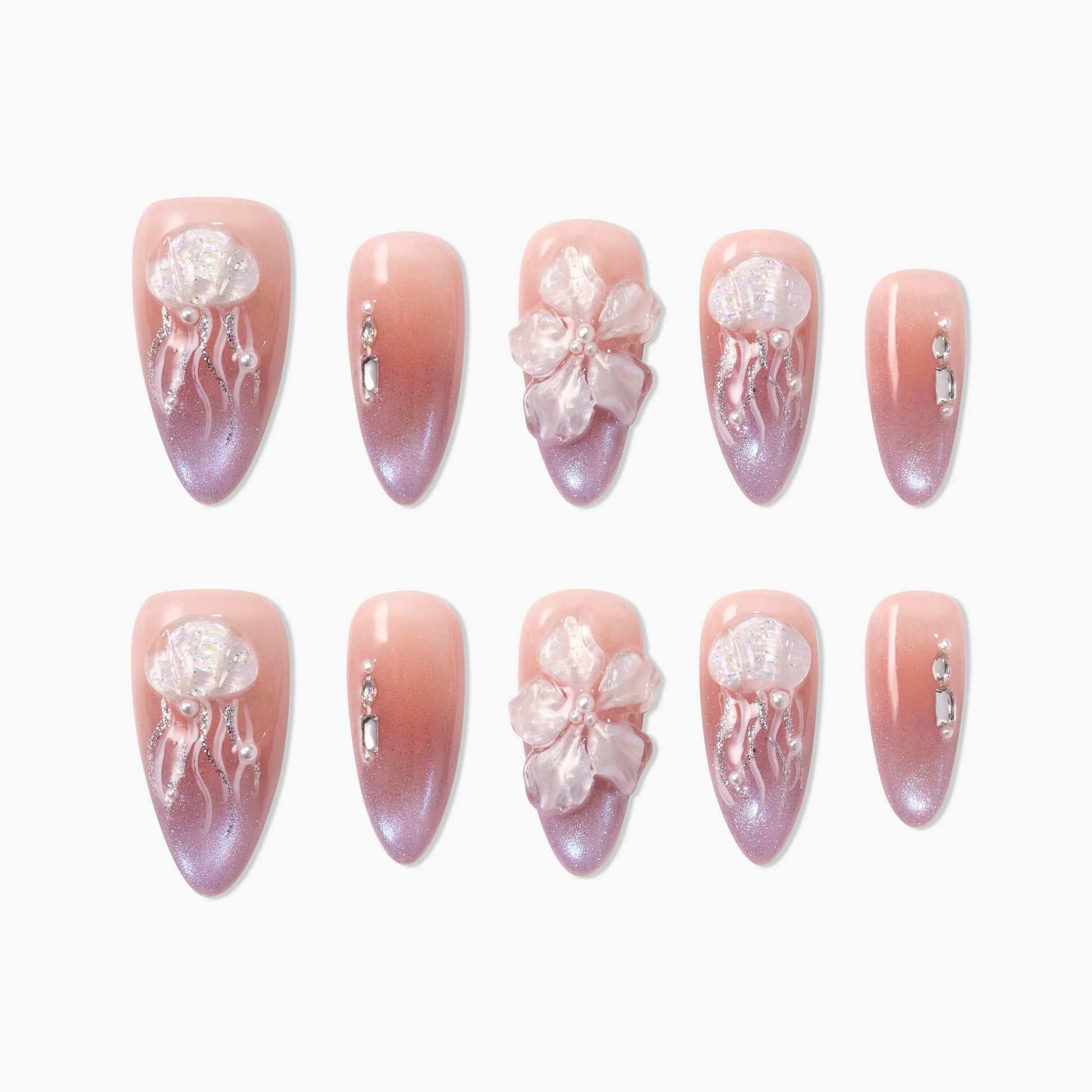 Set of pink ombre press-on nails with 3D jellyfish and flower designs, decorated with pearls and rhinestones