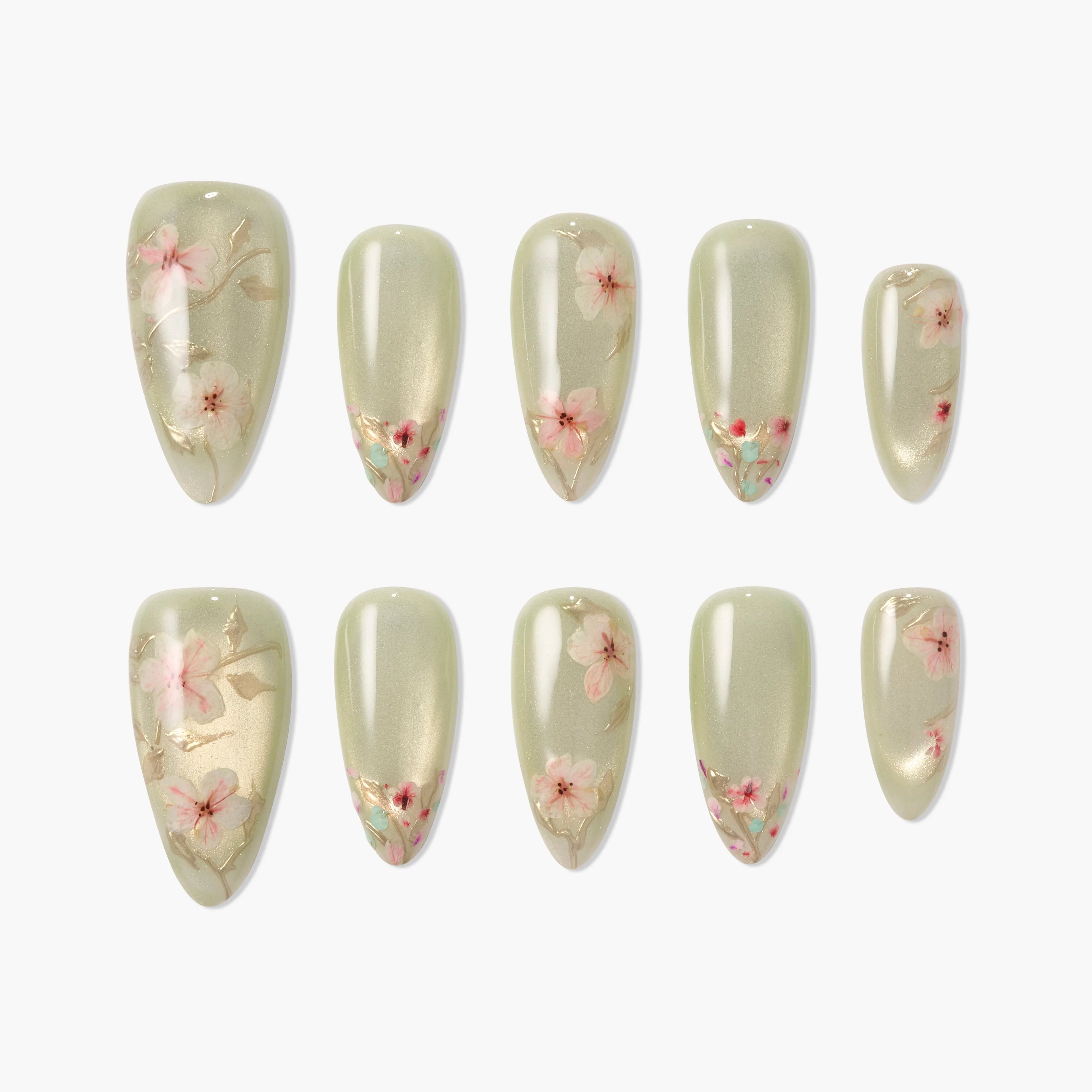 Set of pale green press-on nails with pink cherry blossom floral designs and gold accents