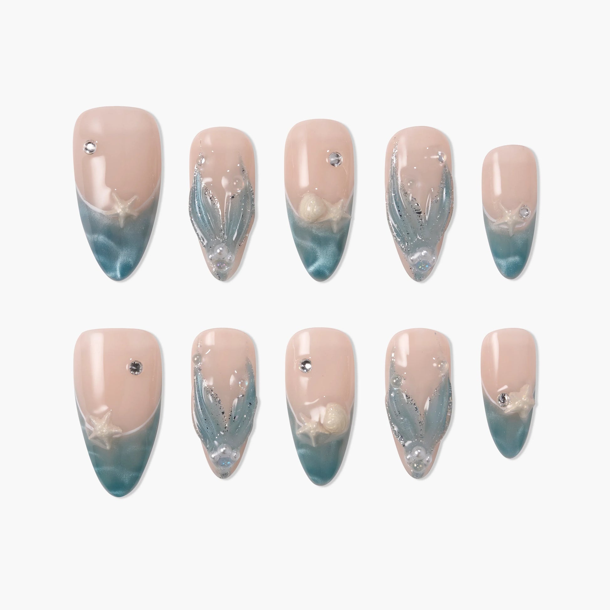 Set of nude and teal press-on nails with 3D starfish, pearls, and rhinestone accents