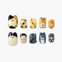 Handmade cat-themed press-on nails in colorful patterns with 3D accents on white background