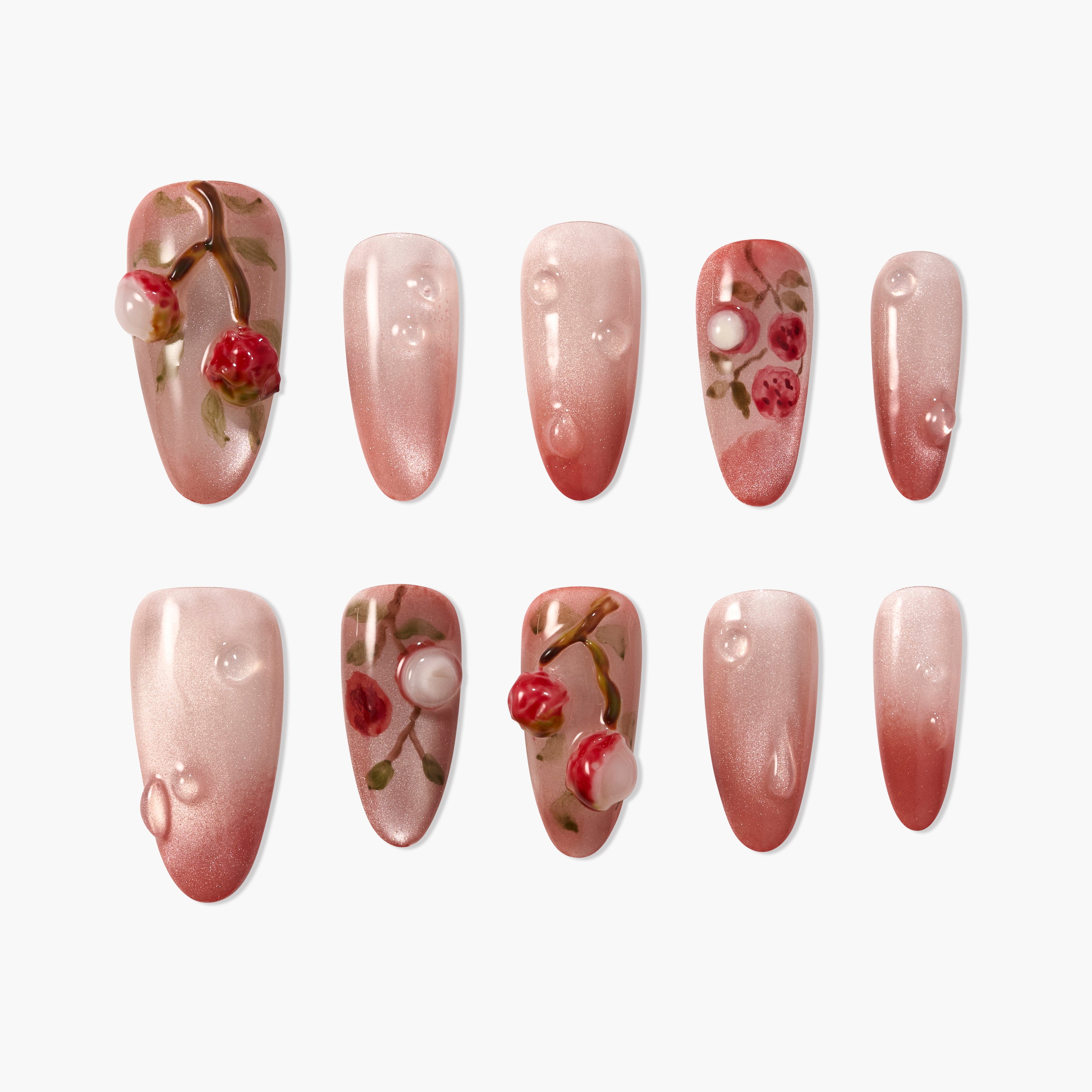 Set of pink ombre press-on nails with 3D cherry and berry nail art accents