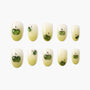 Green apple themed handmade press-on nails set, glossy finish, oval shape, on white background.